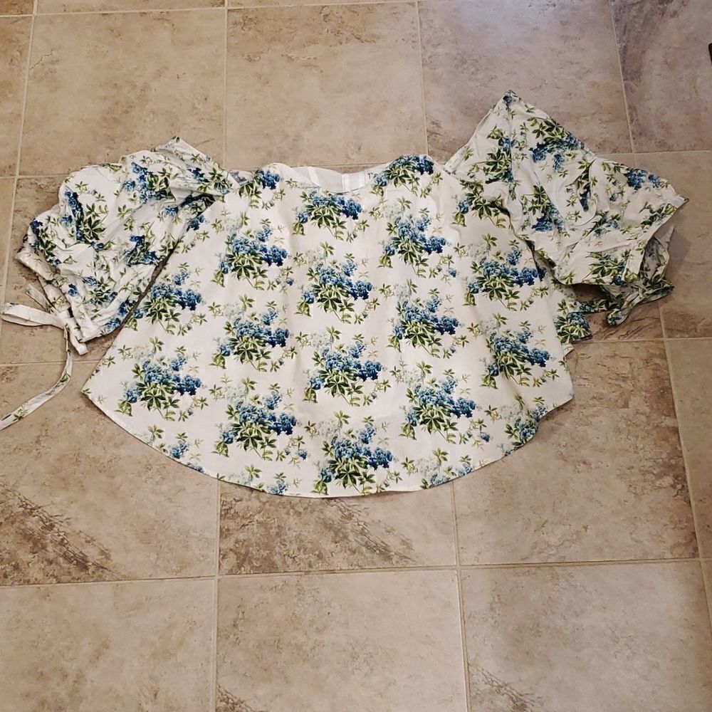 1st Sight open shoulder top with floral design